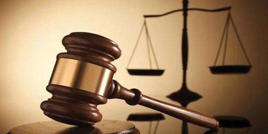تبرئة آسيوي من تهمة تزوير مستند حكومي - الهلال الإخباري